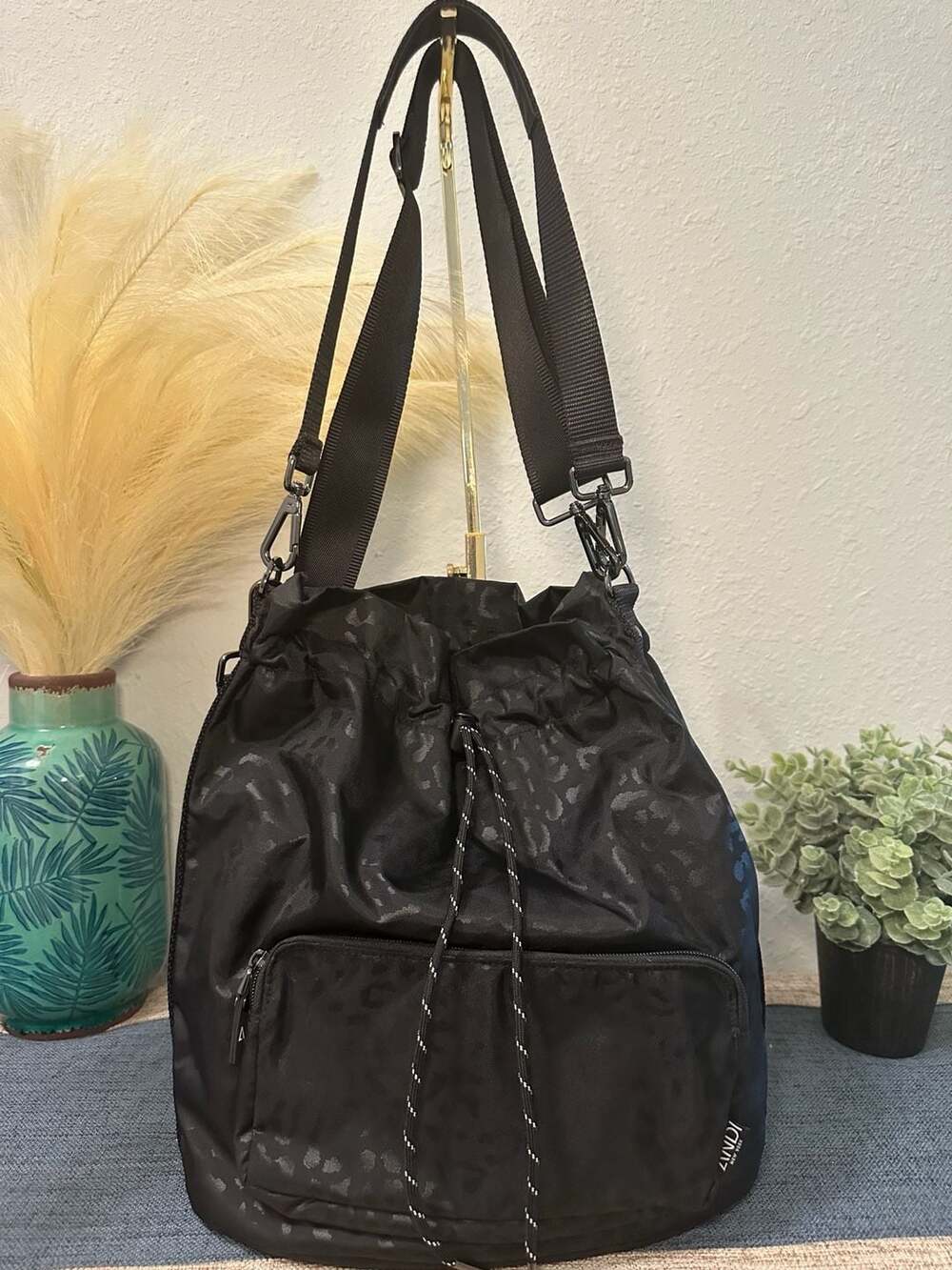 ANDI New York The ANDI Drawstring Bucket Bag in Black Leopard - Picture 2 of 10